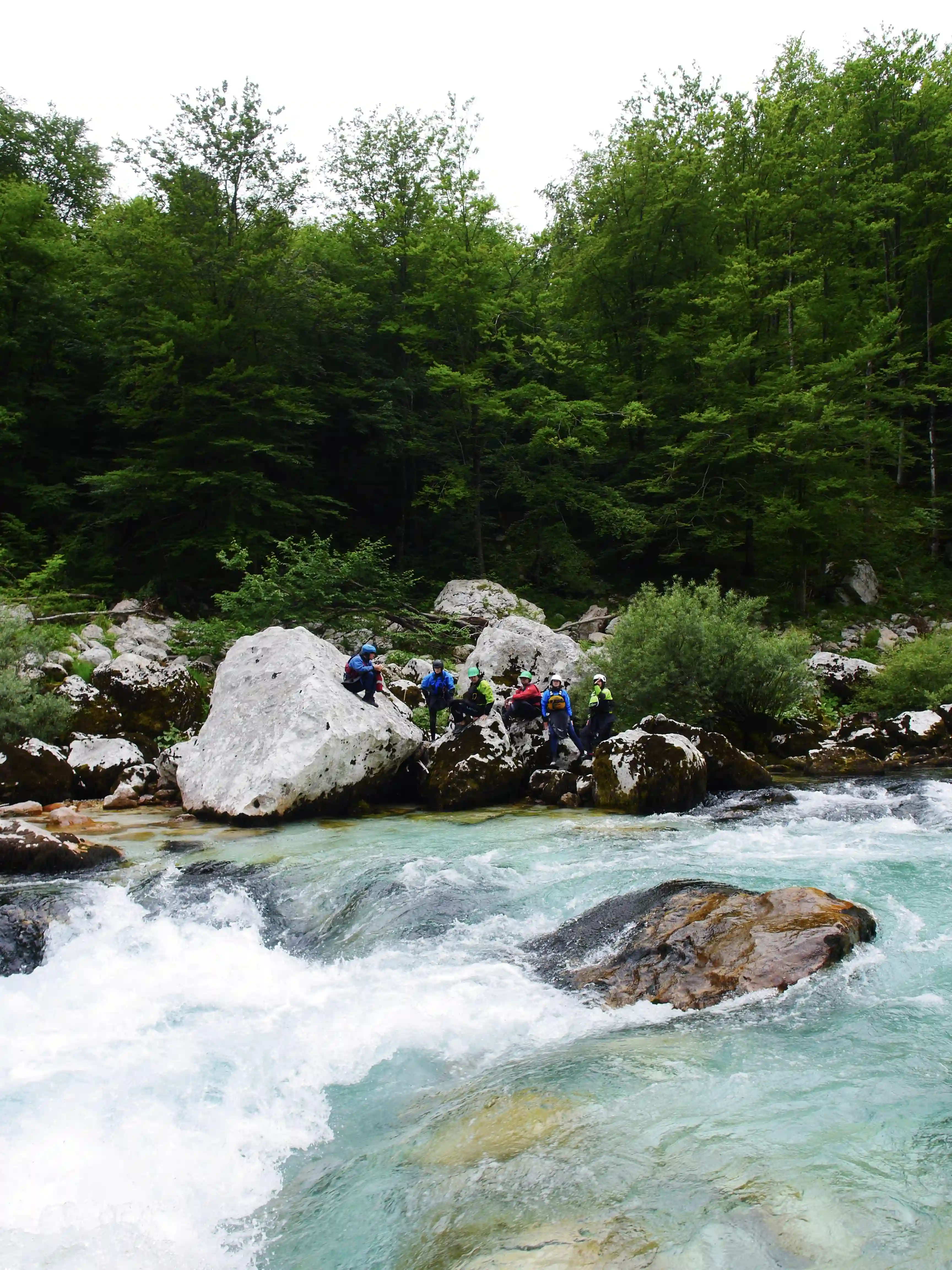 Alpin Kayak Academy course scouting a rapid