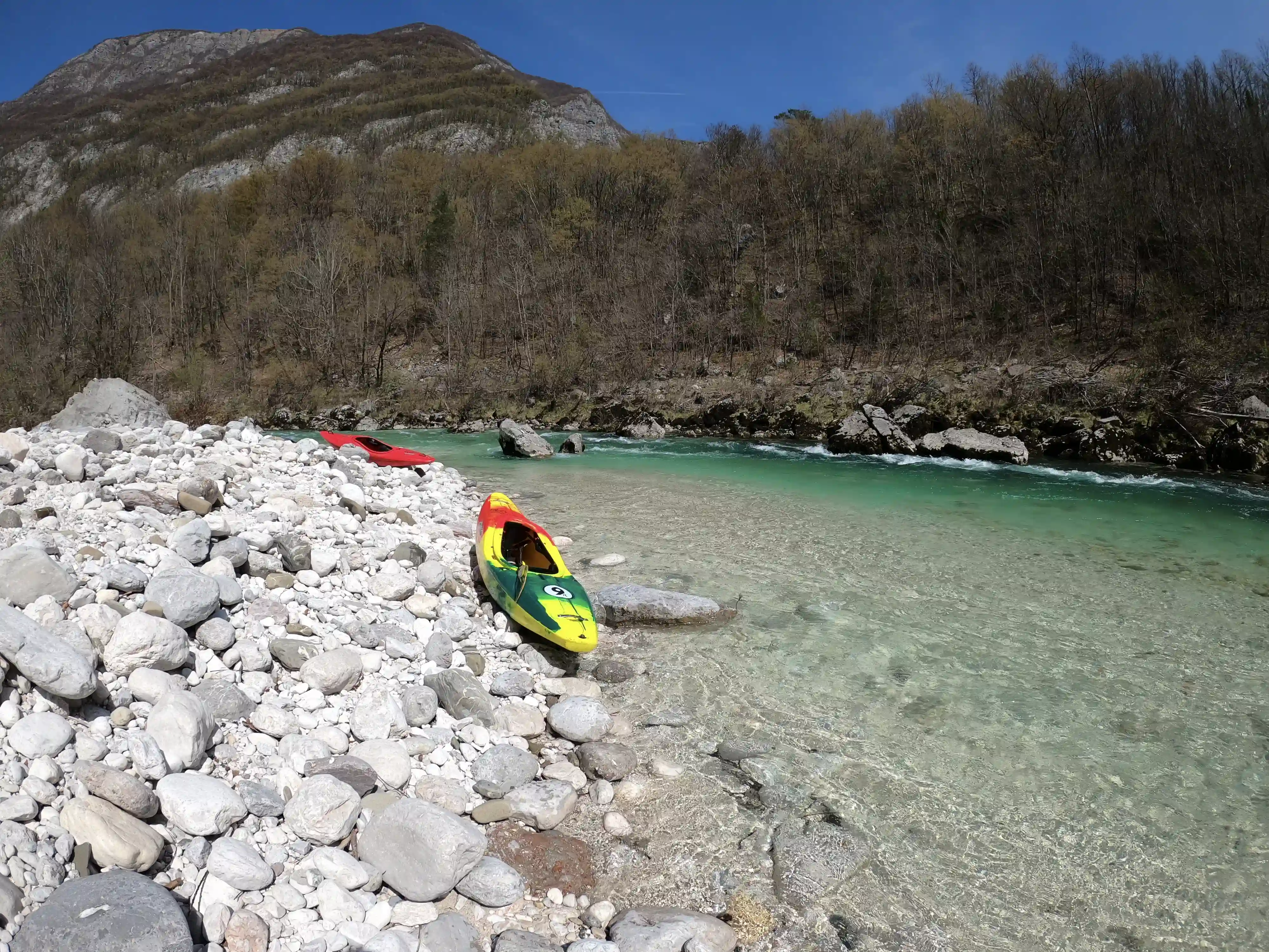 Two boats on the soca river bank